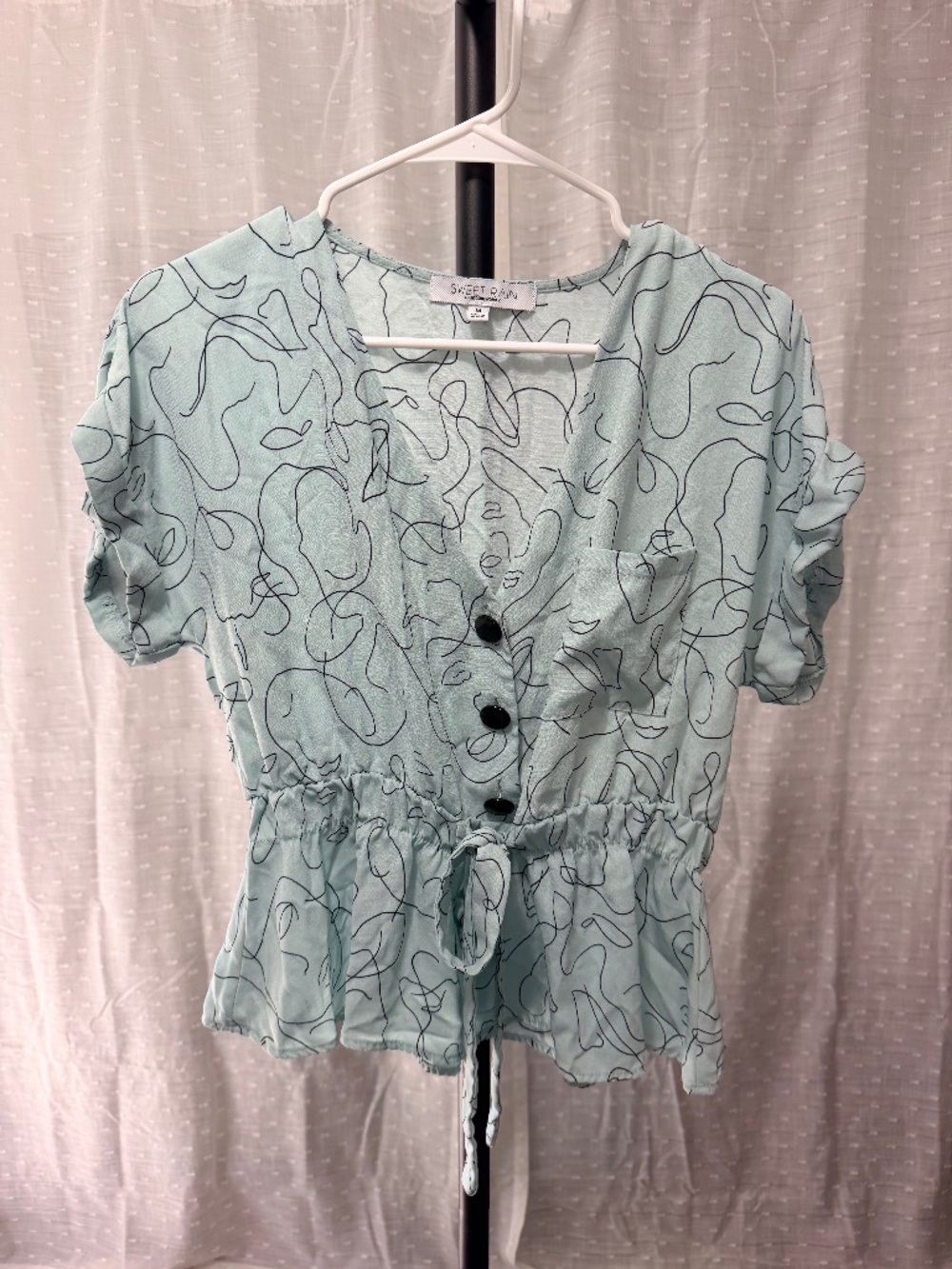 Sweet Rain Abstract Face Peplum Top - M